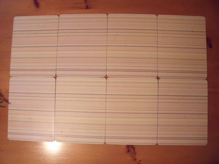 8 rectangular cork-backed place, table mats - muted yellow,oatmeal & brown stripe design.£4 ovno lot