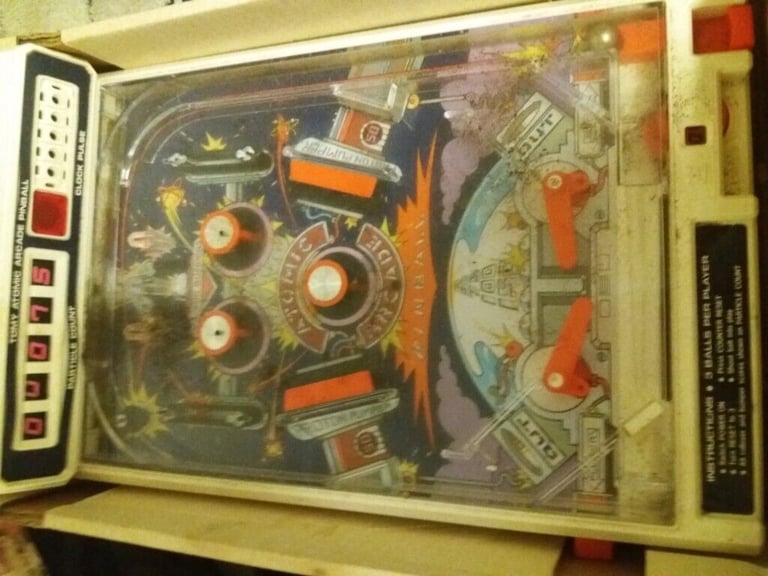 Atomic flipper pinball table 