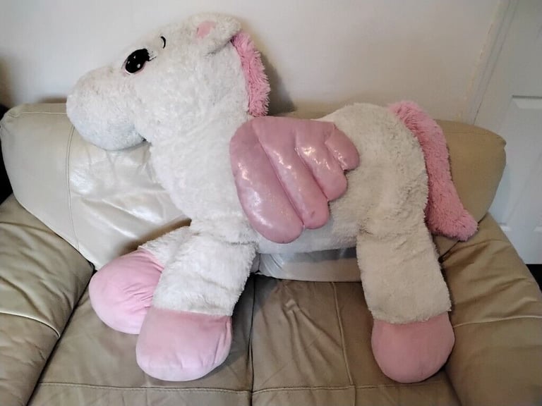 image for UNICORN soft toy 130cm long with tail extended .