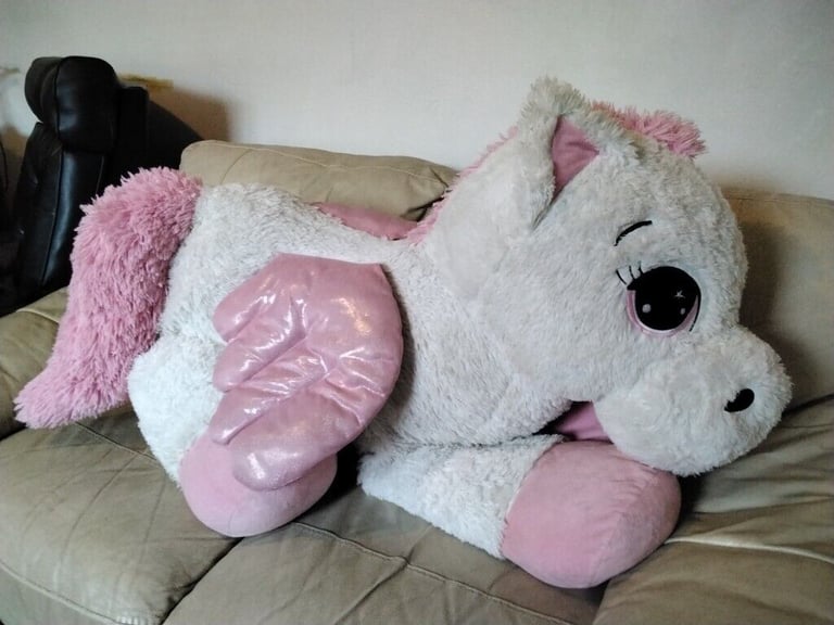 UNICORN soft toy 130cm long with tail extended .