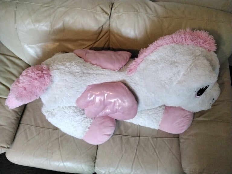 UNICORN soft toy 130cm long with tail extended .
