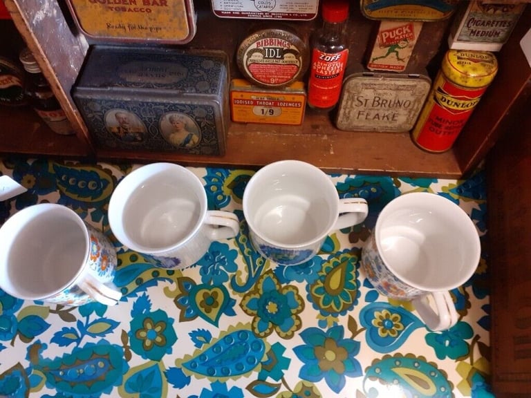 Unused retro mugs. Has gold coloured edging. Made in poland.