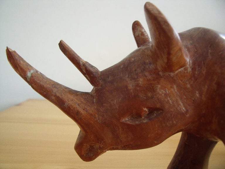 	Vintage genuine Besmo Products hand carved wooden rhino from Kenya. £10 ovno. Can post.