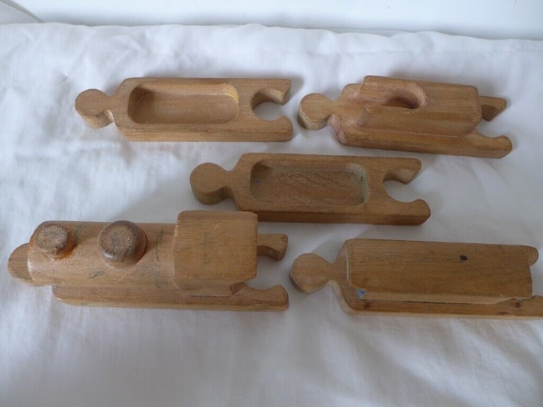 UNUSUAL VINTAGE WOODEN TOY TRAIN. With pieces designed to fit together like a jigsaw puzzle. 
