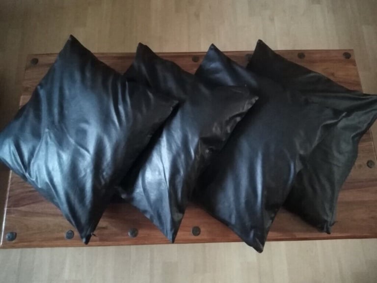 image for 4 x Black faux leather cushion covers.