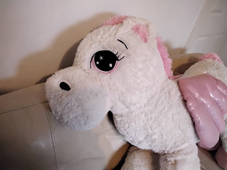 UNICORN soft toy 130cm long with tail extended .