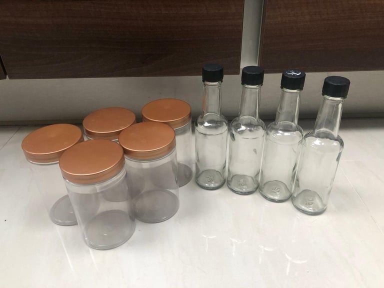 image for 8 plastic storage jars and 4 glass small bottles. Collect Chichester 