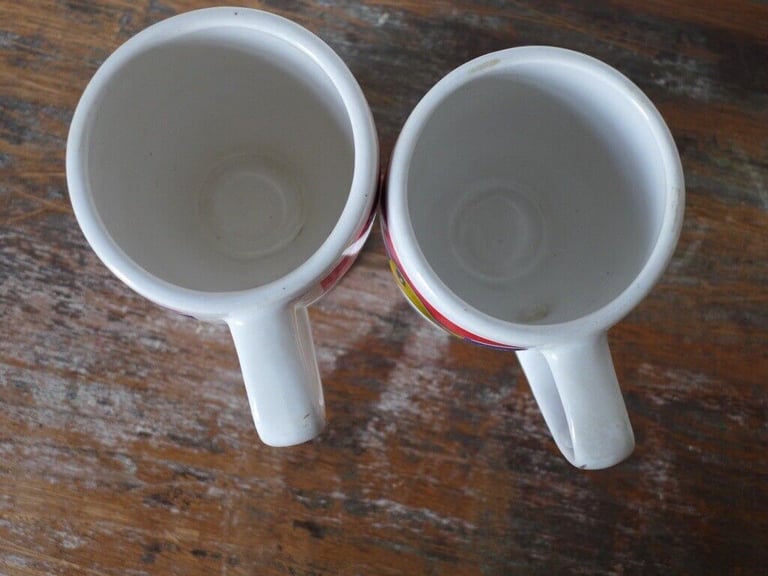 EASTER COLLECTABLES: TWO 1980s VINTAGE CADBURY’S CREME EGG MUGS. £12 for the two.