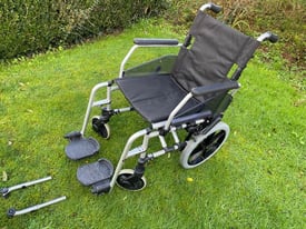 Wheelchair, manual and very sturdy in excellent condition.
