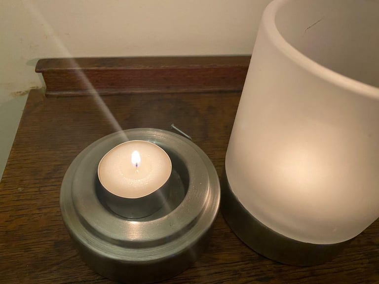 2 glass and stainless steel tealights. 