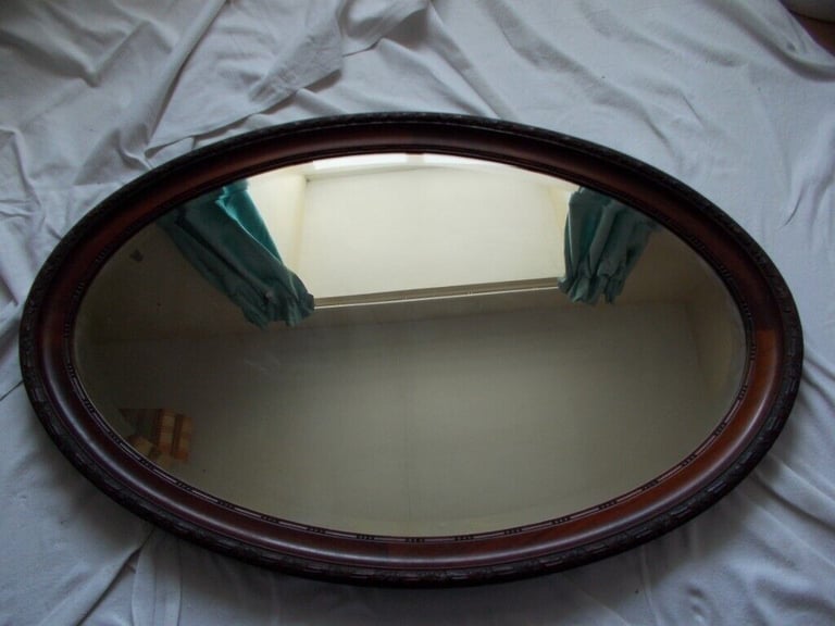 image for Large old Oval oak bevelled mirror 1010mm wide x 660 high (F)