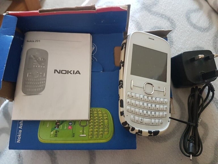 Nokia Asha 201 white handset charger box and instruction book and outer  cover | in Bowerhill, Wiltshire | Gumtree