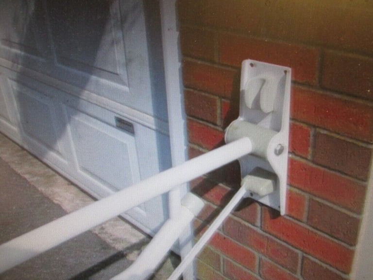 Drop down Shower / Toilet Support Arm,  Bolts solid to wall 