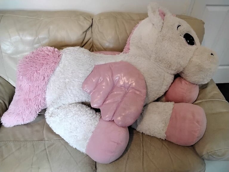UNICORN soft toy 130cm long with tail extended .