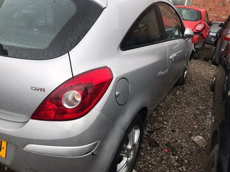 Vauxhall CORSA D. O/S Rear light. Drivers side. 