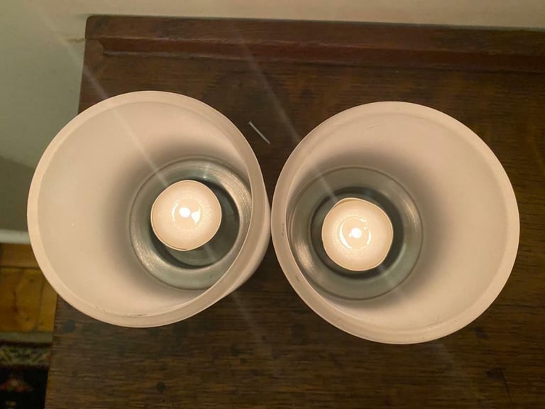 2 glass and stainless steel tealights. 