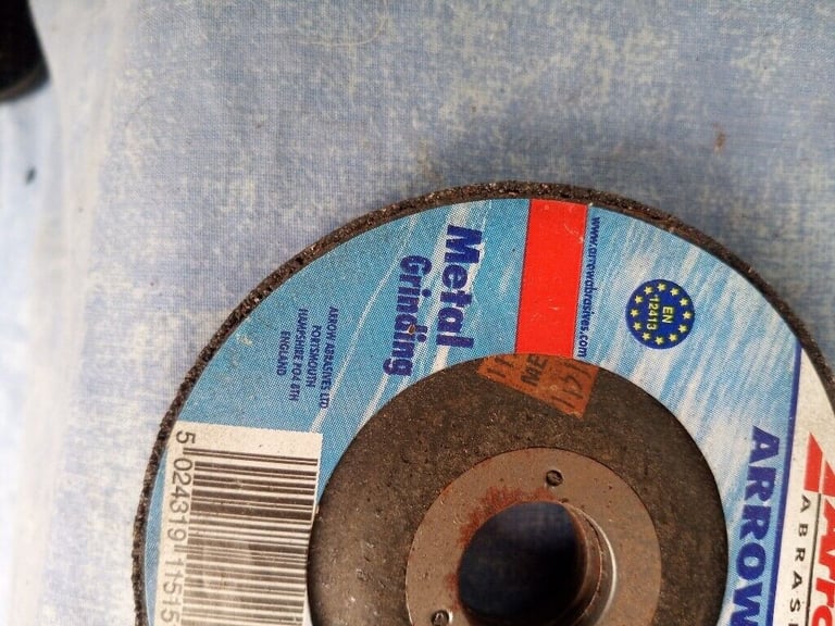 image for Metal grinding disc 4 & 1/2 inches diameter, 7/8 bore, 1/4 thick.