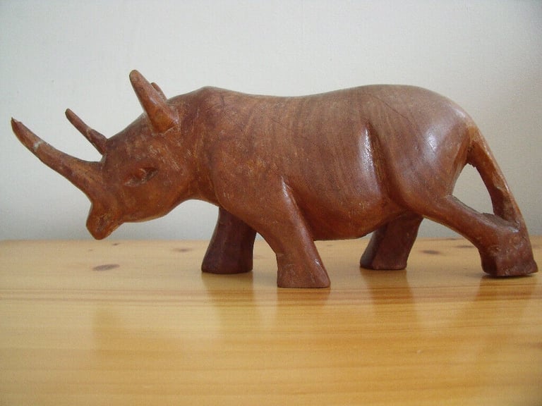 	Vintage genuine Besmo Products hand carved wooden rhino from Kenya. £10 ovno. Can post.