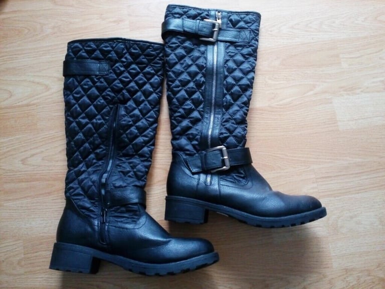Ladies black quilted knee length boots