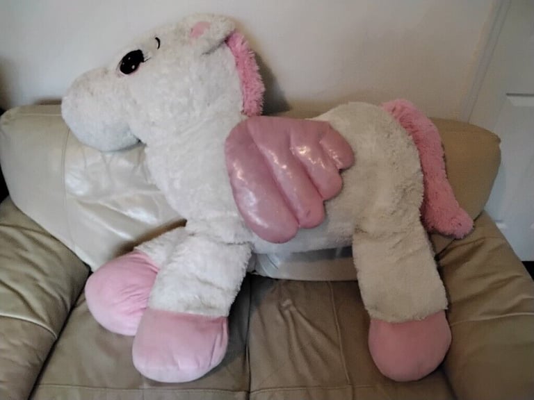 UNICORN soft toy 130cm long with tail extended .