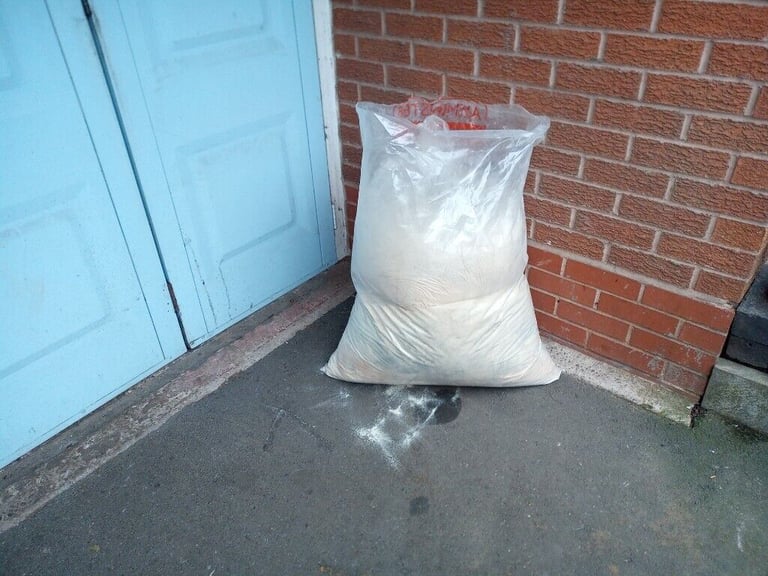 image for Bags of saw dust for clean up of oil, suds, water, chemical's spills