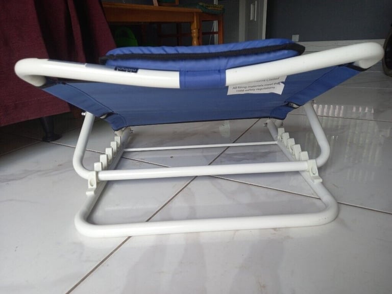 Adjustable back rest with multiple uses