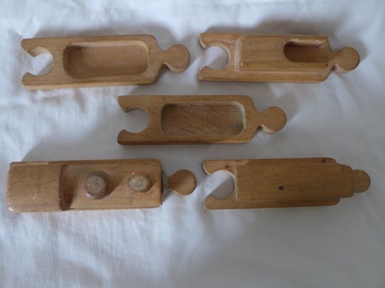 UNUSUAL VINTAGE WOODEN TOY TRAIN. With pieces designed to fit together like a jigsaw puzzle. 