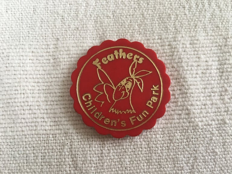 	Vintage token, Dymchurch amusements park. Feather's Children's Fun Park. Phoenix Amusements Ltd.