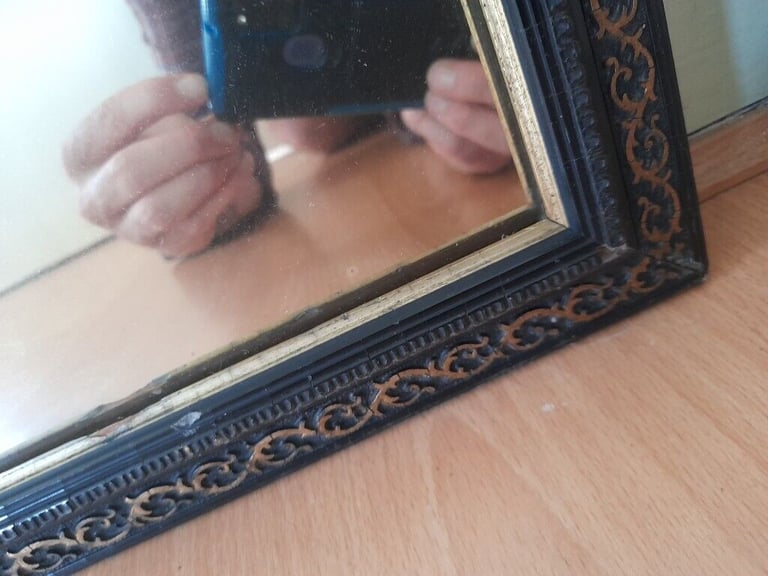 Mirror with decorative frame
