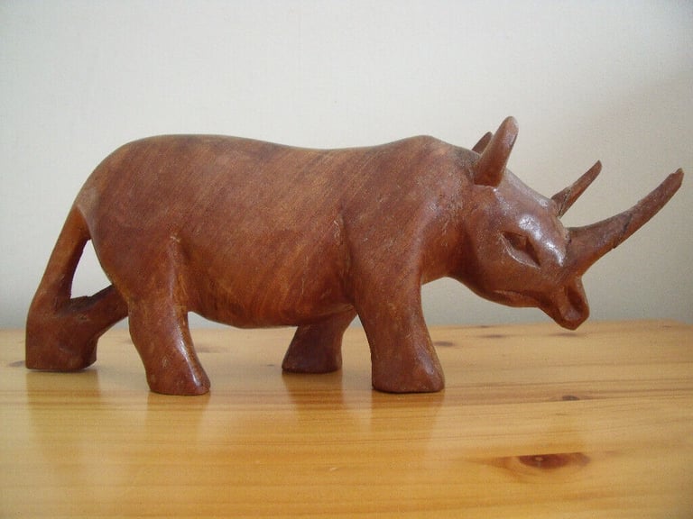 	Vintage genuine Besmo Products hand carved wooden rhino from Kenya. £10 ovno. Can post.