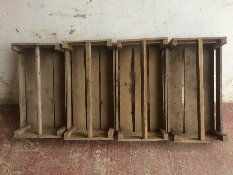 Wooden potato seed boxes.