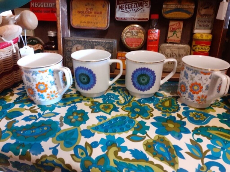 Unused retro mugs. Has gold coloured edging. Made in poland.