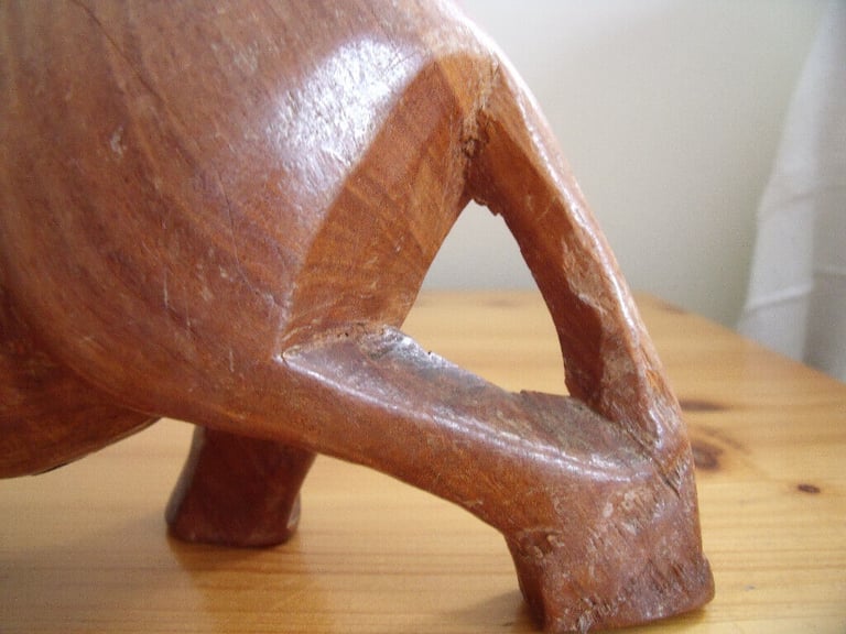 	Vintage genuine Besmo Products hand carved wooden rhino from Kenya. £10 ovno. Can post.