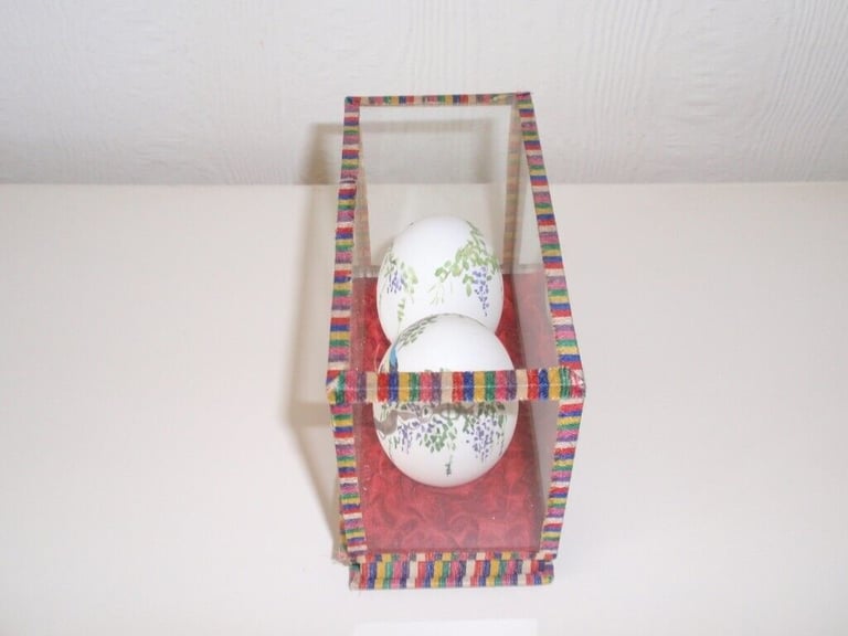 Set of two Chinese style painted eggs in display box