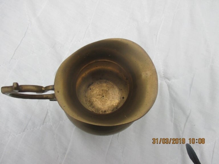 SMALL BRASS JUG. 14cms high x 8 cms dia incl the handle. 0.4 kgs. Very good clean condition.