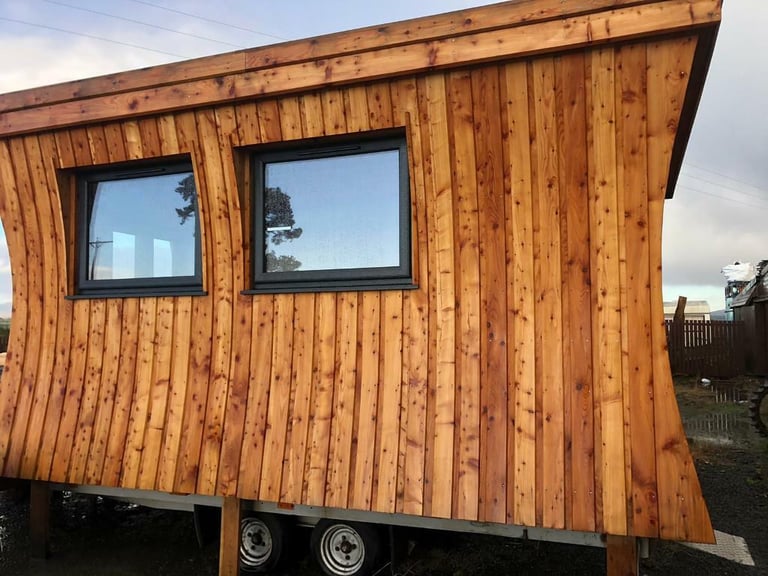 Scottish larch cladding square edge and waney edge 