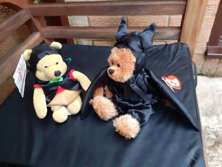New Disney Bat Pooh and New Ty Bat Bear Beanie Babies.