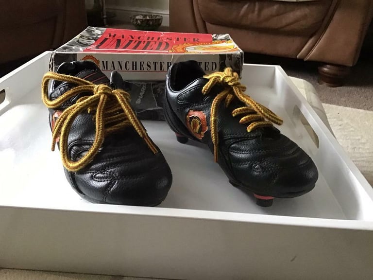 Manchester United  child’s football boots size 12  