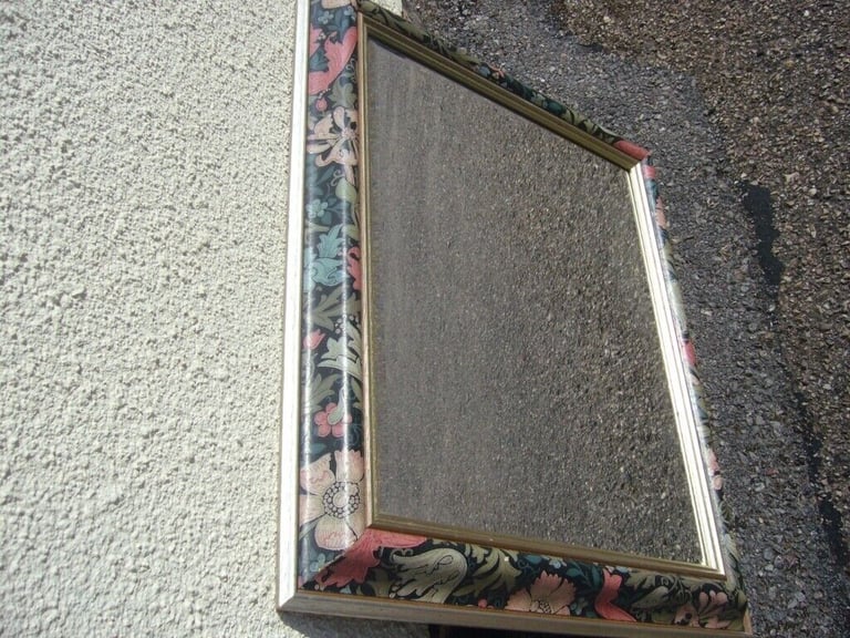 Green flowery border ornate mirror