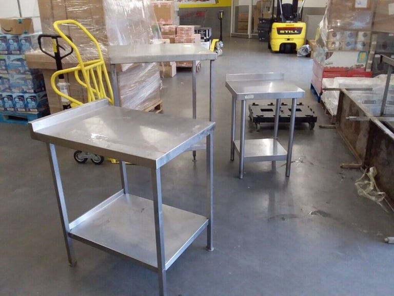 Catering equipment commercial stainless steel prep tables sinks shelves kitchen items 