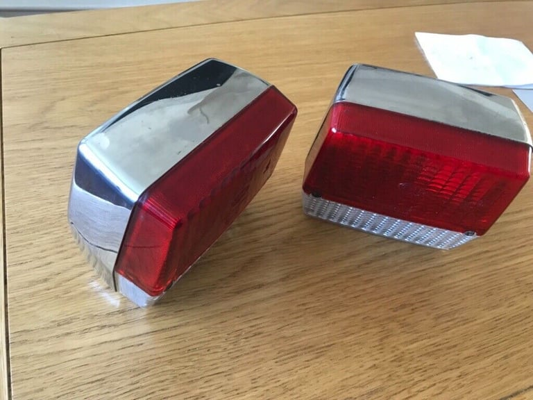 Two chrome trailer lights Hella.