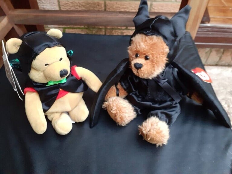 New Disney Bat Pooh and New Ty Bat Bear Beanie Babies.