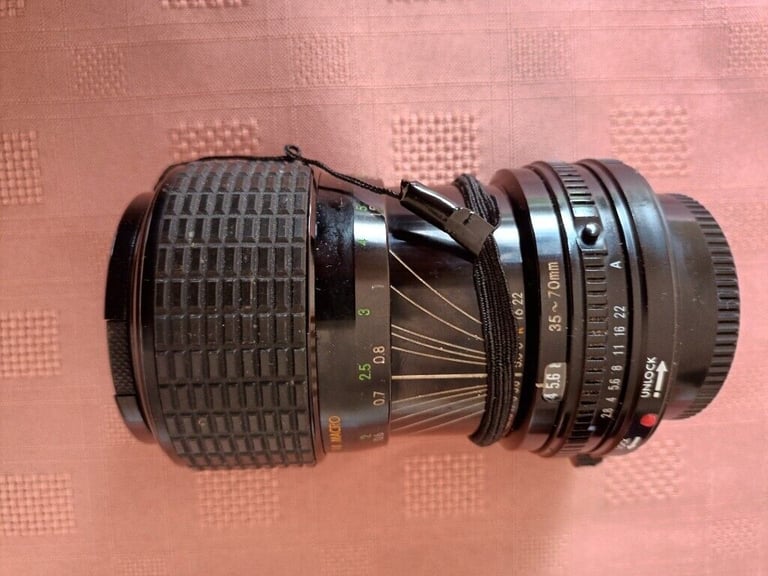 image for Sigma ZOOM-MASTER 35 -70 mm Lens Canon mount, with case.