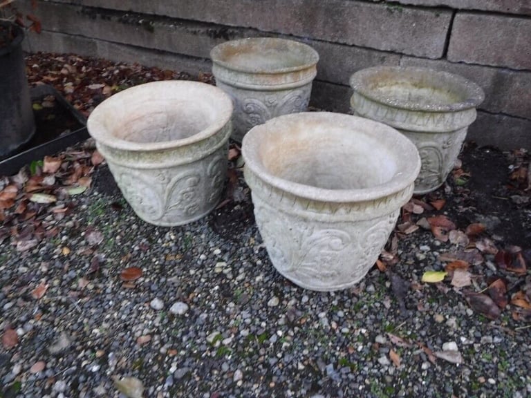 image for Large concrete pots 4 off round.(planters)