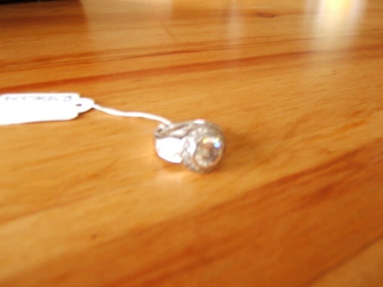 Brand New Rhodium Silver Ring Embedded with Round Shape Cubic Zirconia Size O .5 £79 RRP