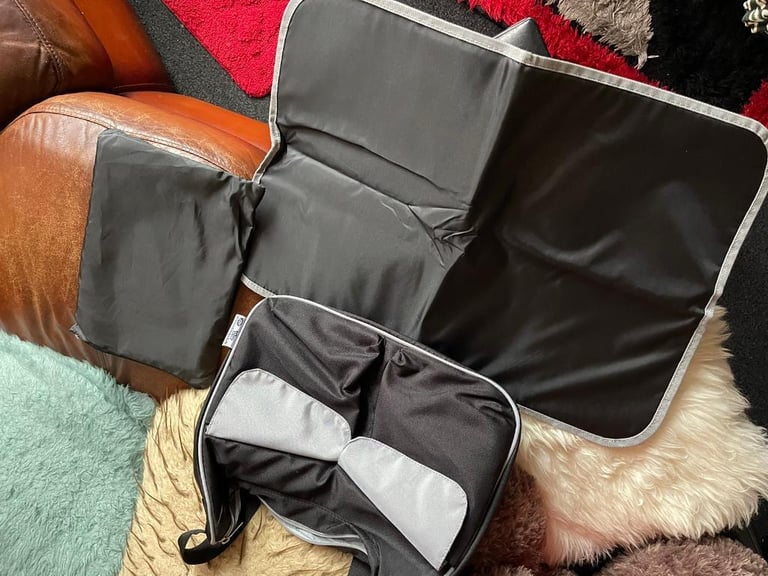 New aBaby changing bag with including a changing mat .