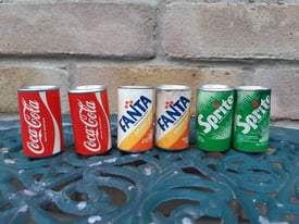 Very old miniature cans