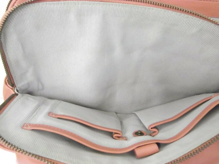 RADLEY Ladies handbag coral coloured leather shoulder bag with dog bag charm,Very good condition.