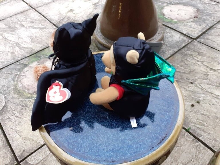 New Disney Bat Pooh and New Ty Bat Bear Beanie Babies.