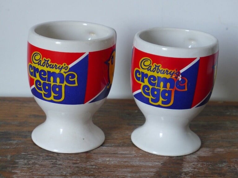 EASTER COLLECTABLES: TWO 1980s VINTAGE CADBURY’S CREME EGG MUGS. £12 for the two.